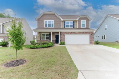 Welcome to this stunning home, designed with modern living in - Lake Home For Sale in Troutman, North Carolina