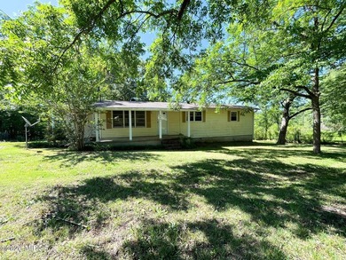 Welcome home to this 3 bedroom, 1.5 bath home tucked away on a - photo 1