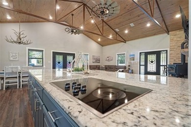 Private 3-bedroom, 2-bath metal home on 40 wooded acres in - photo 14
