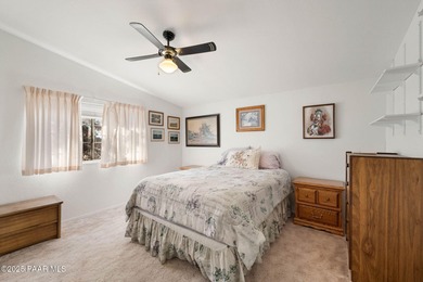 Set on a beautifully landscaped 0.8-acre lot in Paulden, AZ