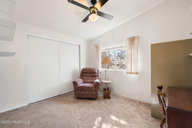 Set on a beautifully landscaped 0.8-acre lot in Paulden, AZ