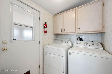 Set on a beautifully landscaped 0.8-acre lot in Paulden, AZ