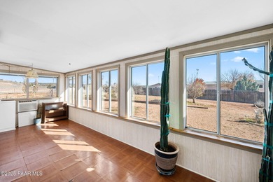 Set on a beautifully landscaped 0.8-acre lot in Paulden, AZ