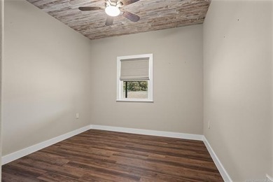 Private 3-bedroom, 2-bath metal home on 40 wooded acres in - photo 26