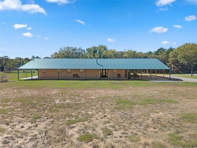 Private 3-bedroom, 2-bath metal home on 40 wooded acres in - photo 32