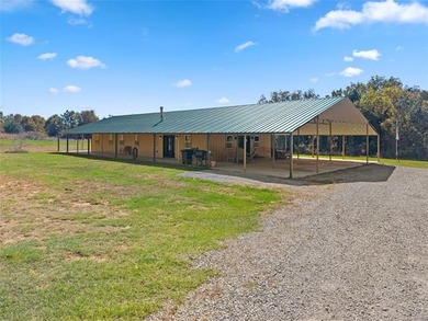 Private 3-bedroom, 2-bath metal home on 40 wooded acres in - photo 33