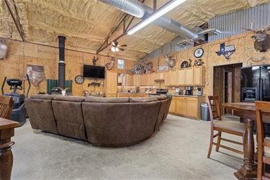 Private 3-bedroom, 2-bath metal home on 40 wooded acres in - photo 44