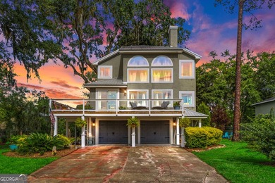 Coastal Oasis with breathtaking marsh views! Nestled on - photo 1