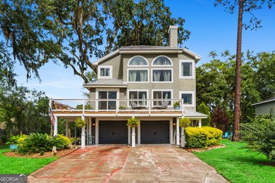 Coastal Oasis with breathtaking marsh views! Nestled on - photo 2