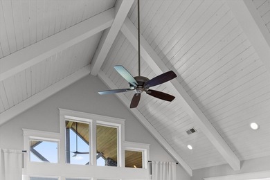 Experience exceptional waterfront living in this custom-built - photo 12