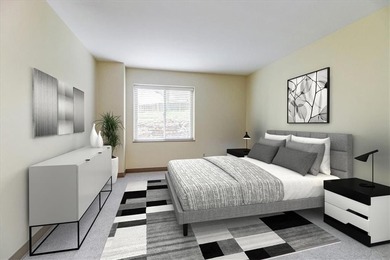 This is the one! Oak Hall Condominium Unit 106 is conveniently