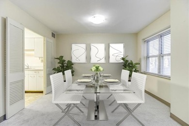 This is the one! Oak Hall Condominium Unit 106 is conveniently