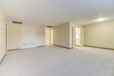 This is the one! Oak Hall Condominium Unit 106 is conveniently