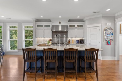 Experience exceptional waterfront living in this custom-built - photo 19