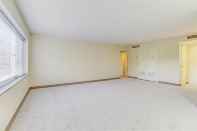 This is the one! Oak Hall Condominium Unit 106 is conveniently