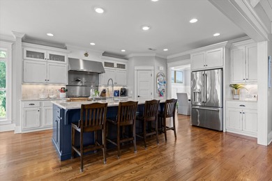 Experience exceptional waterfront living in this custom-built - photo 20