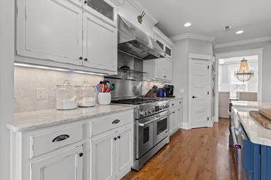 Experience exceptional waterfront living in this custom-built - photo 25