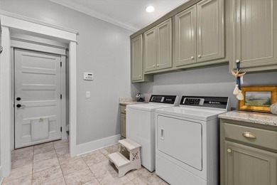 Experience exceptional waterfront living in this custom-built - photo 48