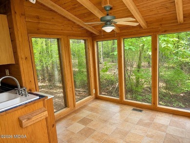 Tucked away on a private wooded setting just minutes from Lake - photo 5
