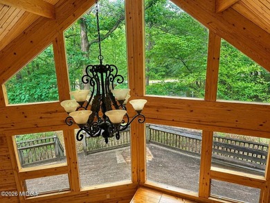 Tucked away on a private wooded setting just minutes from Lake - photo 6