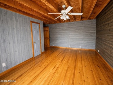 Tucked away on a private wooded setting just minutes from Lake - photo 9