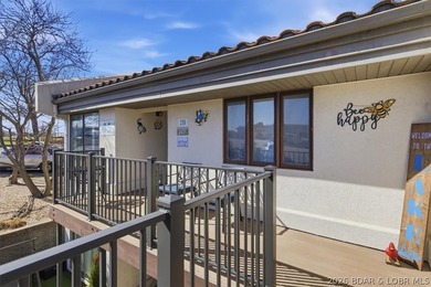 This spacious 1,500 sq. ft. 2BR/2BA condo is ideally located on - photo 3