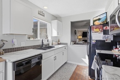 This spacious 1,500 sq. ft. 2BR/2BA condo is ideally located on - photo 6