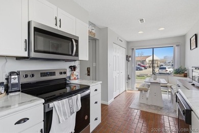 This spacious 1,500 sq. ft. 2BR/2BA condo is ideally located on - photo 8
