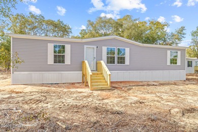 Welcome to this BRAND NEW 2026 Model, 3 bedroom/2 bath - photo 2