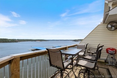This beautifully updated condo sits high above the lake with - photo 2
