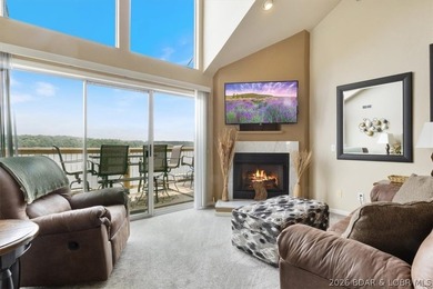 This beautifully updated condo sits high above the lake with - photo 3