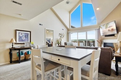 This beautifully updated condo sits high above the lake with - photo 4