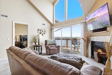 This beautifully updated condo sits high above the lake with - photo 6