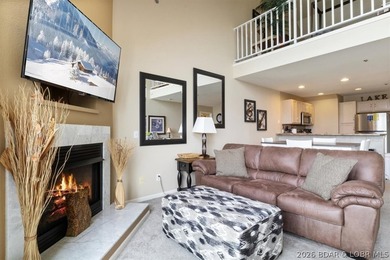 This beautifully updated condo sits high above the lake with - photo 7