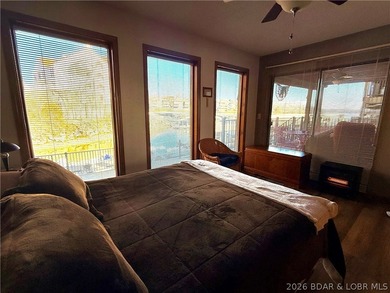 Step into easy lake living with a completely turn-key 2 bed, 2