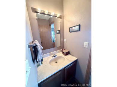 Step into easy lake living with a completely turn-key 2 bed, 2