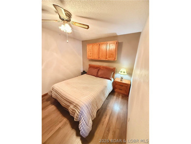 Step into easy lake living with a completely turn-key 2 bed, 2