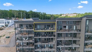 UPSCALE LAKEFRONT CONDO! Discover style with this 2023-built - photo 6