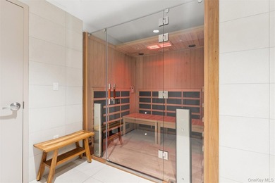 Experience elevated coastal living in this stunning one-bedroom - photo 22