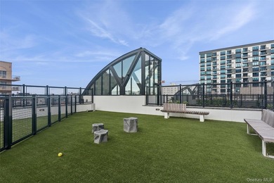 Experience elevated coastal living in this stunning one-bedroom - photo 34