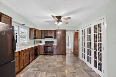 Spacious Cape Cod home with serene golf course views just - photo 12