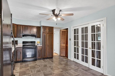 Spacious Cape Cod home with serene golf course views just - photo 13