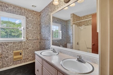 Spacious Cape Cod home with serene golf course views just - photo 31