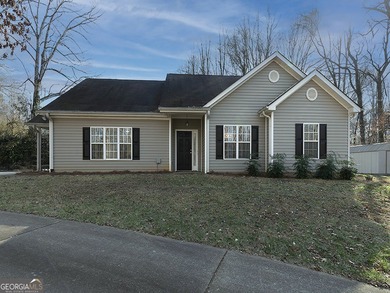 Charming two bedroom, two bath, RANCH on almost 1 acre in Canton