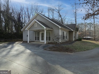 Charming two bedroom, two bath, RANCH on almost 1 acre in Canton