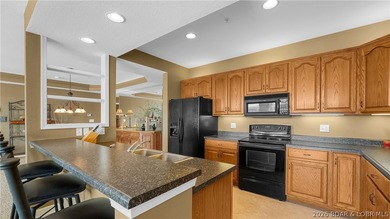 Huge screened deck, 12x32 boat slip with 8,000 lb lift, and rare