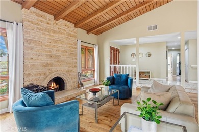 A gated courtyard entry sets the tone for this charming - photo 3