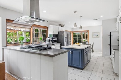 A gated courtyard entry sets the tone for this charming - photo 6