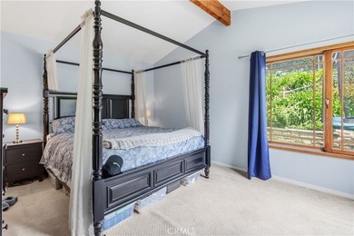 A gated courtyard entry sets the tone for this charming - photo 10