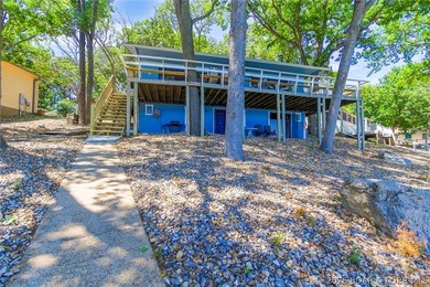 Enjoy unbeatable lake views from this beautifully updated - photo 5
